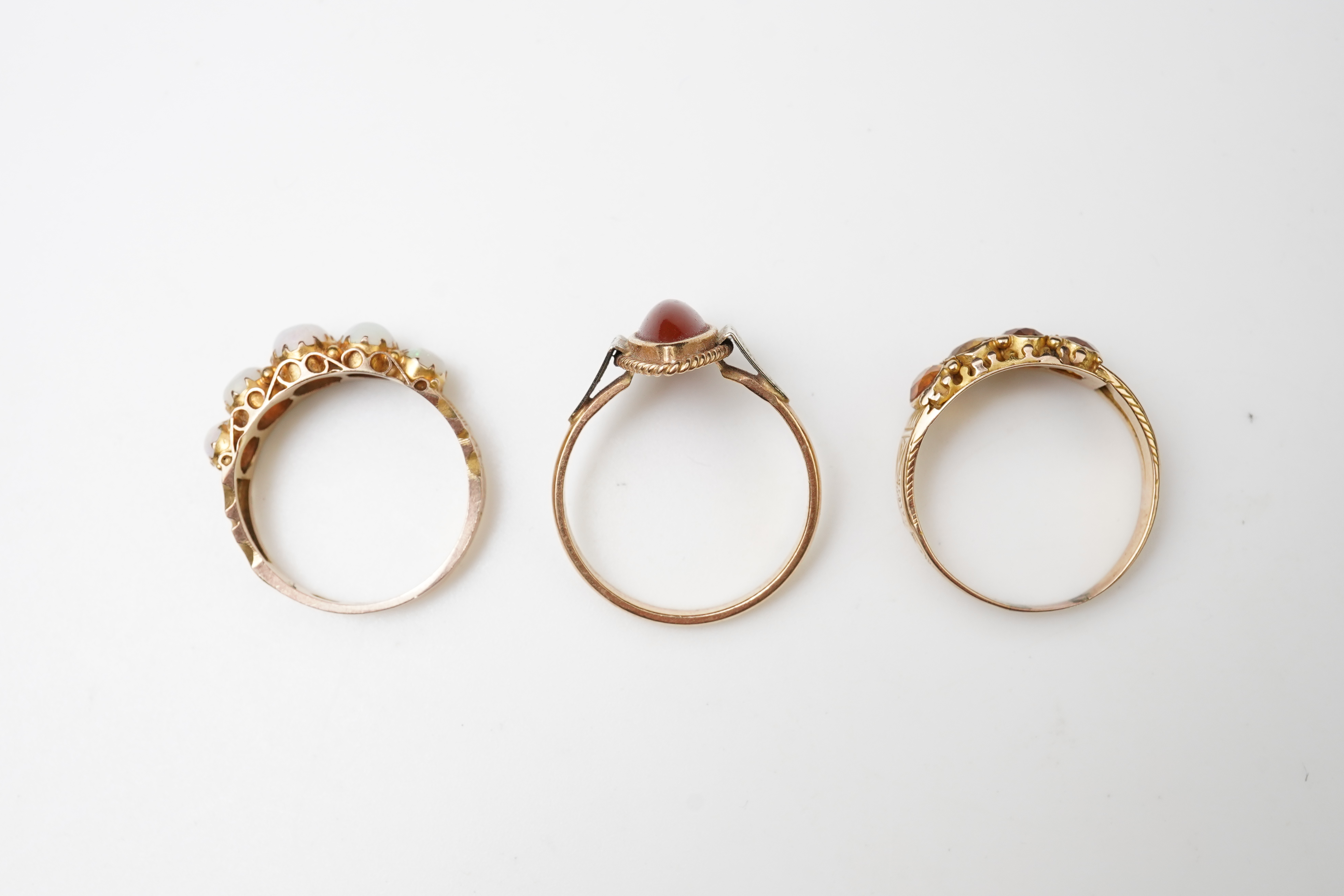 Three gem-set rings